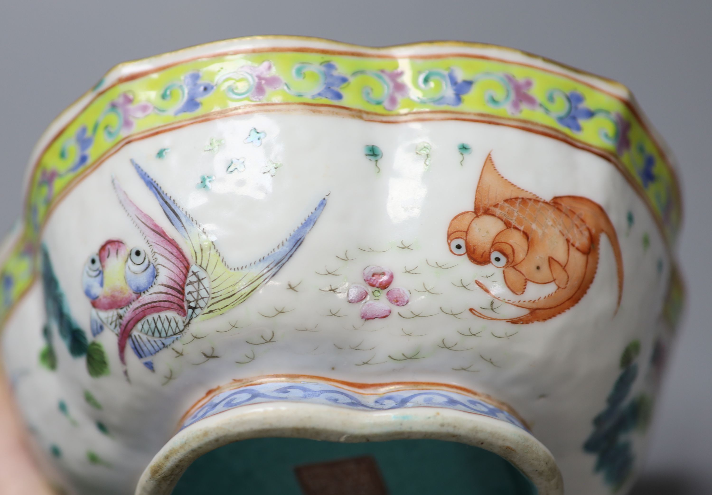 A Chinese polychrome famille rose petal lobed bowl, Tongzhi seal mark and period, diameter 18cm
